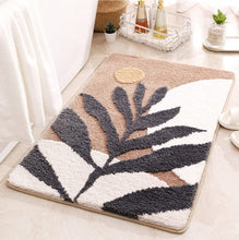 Load image into Gallery viewer, Decorative rug with leaf pattern on a light-colored floor