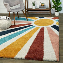 Load image into Gallery viewer, Colorful geometric-patterned rug in a room with a chair and shelves.